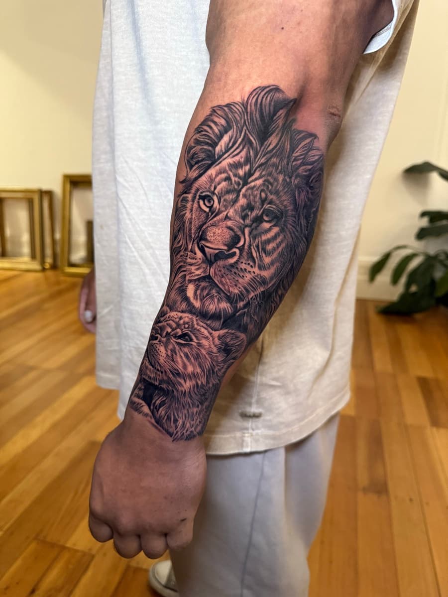 Detailed Polynesian sleeve tattoo showing traditional patterns